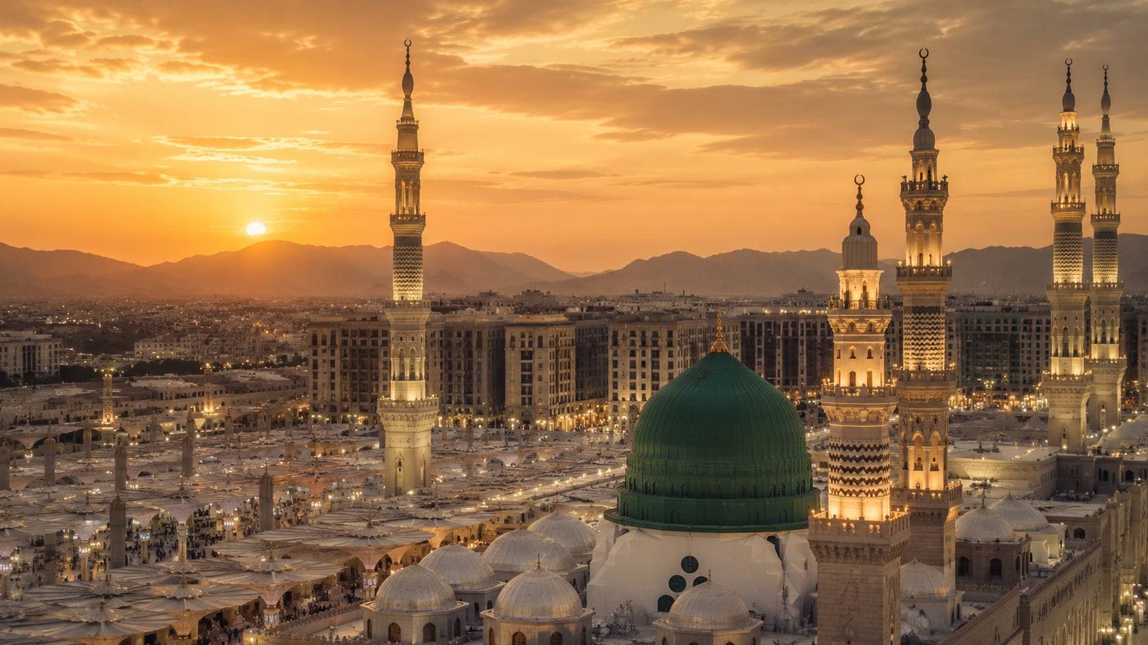 Masjid an-Nabawi green dome at sunset in Madinah, Saudi Arabia